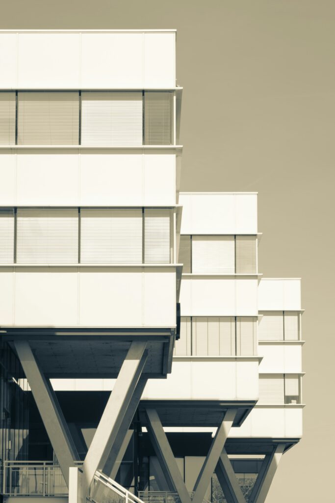 Modern minimalist office building architecture (contextual image)